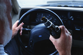 driving whlile drinking a beer